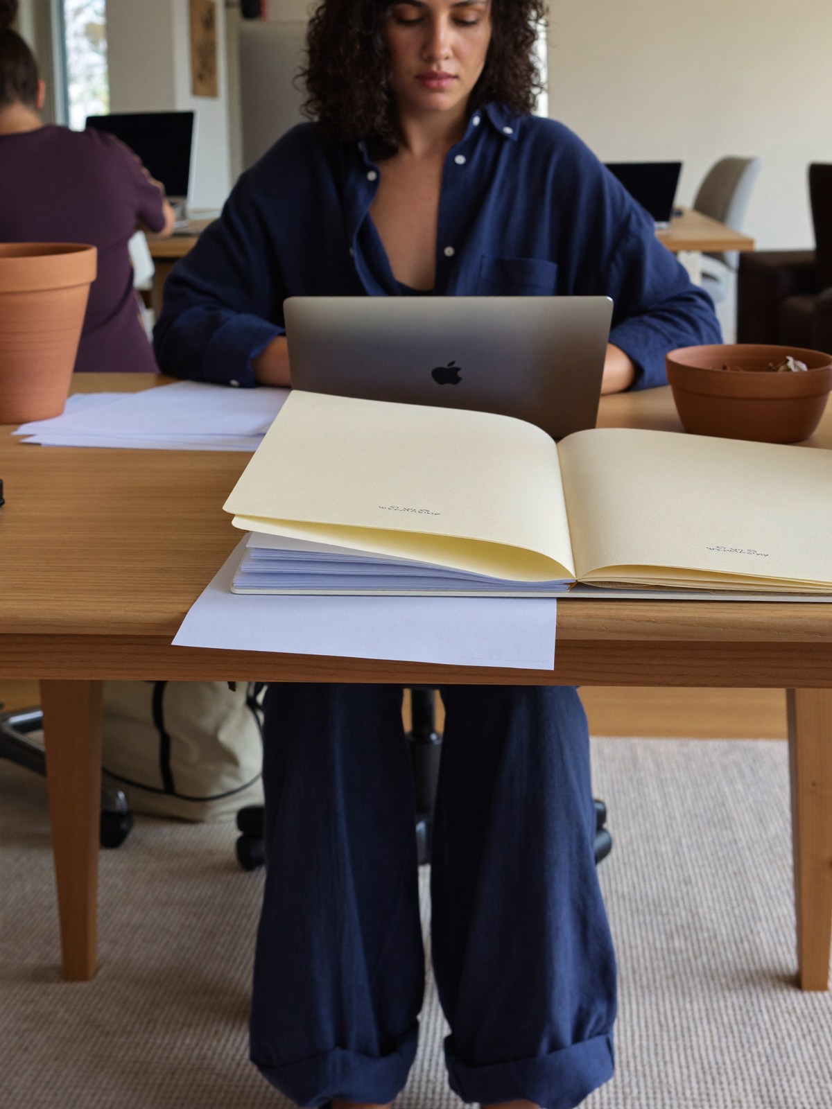 Business owner reviewing company records at a home office