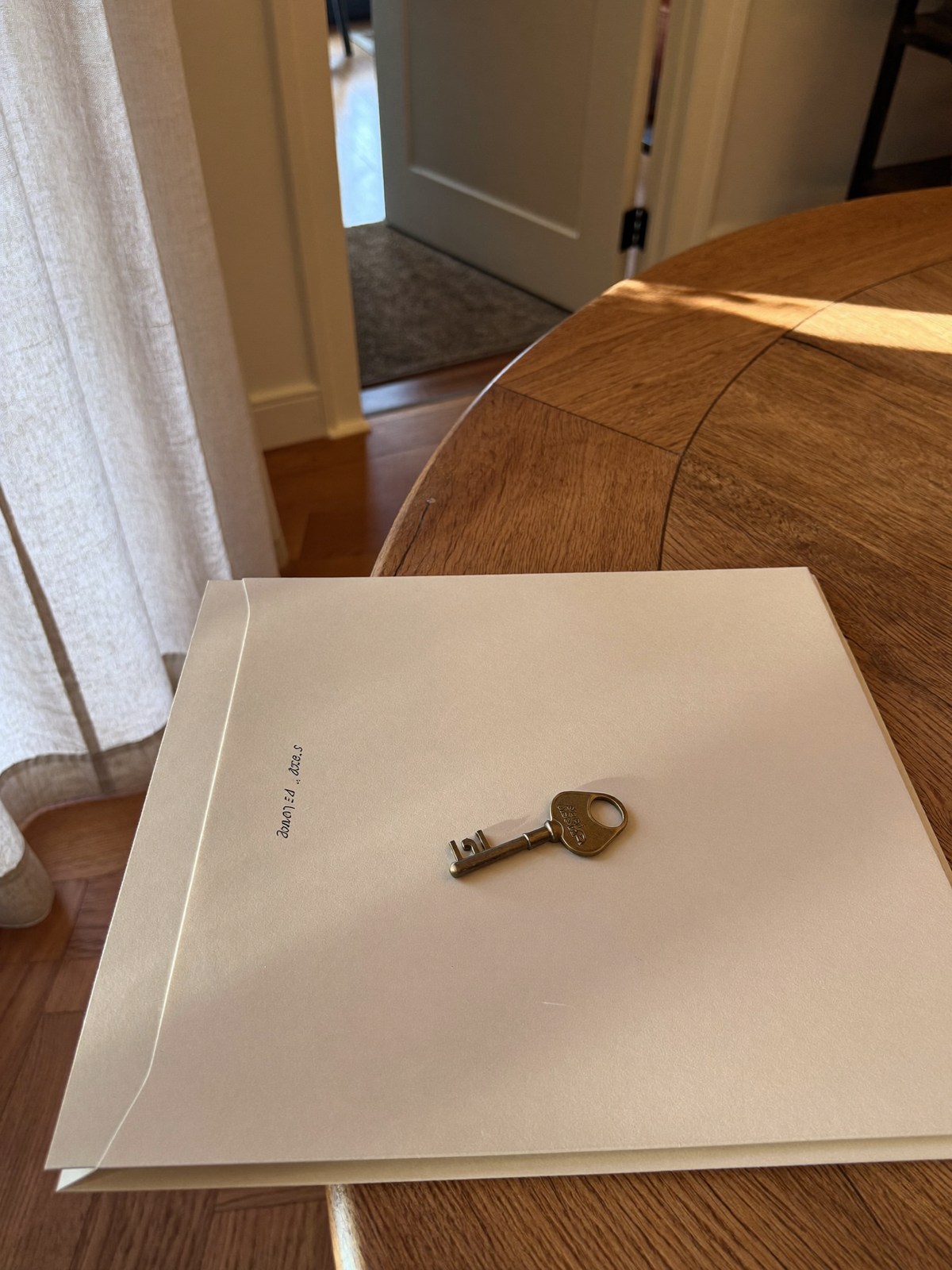 House key and organized folders for a closing review